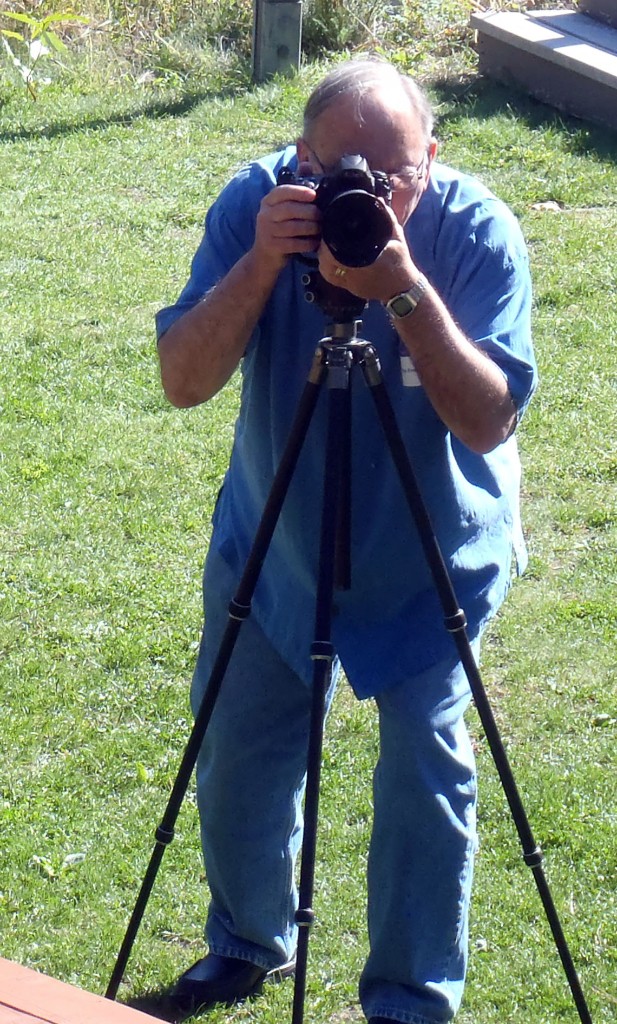 Stan Froehner taking a photograph